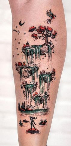 an artistic tattoo on the leg of a woman