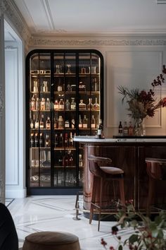 Elevate your entertaining space with our top 5 Home Bar Design Ideas for a Chic Look that blend style and function seamlessly. Residential Bar Design Modern, Library Bar Home, Dark And Moody Home Bar, At Home Bar Room, Bar Seating Design, Open Shelf Bar Ideas, Parisian Home Bar, Led Lights Bar Interior Design, Bar Niche Ideas