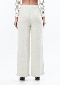 An effortless, easy silhouette, Jonny Cota's Tailored Linen Trousers are an instant closet workhorse with a relaxed trouser silhouette that sits on the high natural waist. — Zip and tab closure at waistband— 50% linen, 50% rayon SIZE + FIT— Flared straight leg— Trouser fitCARE— Dry clean, or hand wash cold, lay flat to dry, and iron on low as needed Versatile Full-length Beige Pants, Versatile Beige Straight Leg Pants, Versatile Straight Leg Neutral Pants, Versatile Neutral Straight Leg Pants, Versatile Full Length Beige Bottoms, Cream High-waisted Linen Pants, Beige Wide Leg Full Length Pants For Spring, High-waisted Cream Linen Pants, Cream Linen Workwear Pants