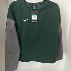 New With Tags Nike Womens Green And Gray Pull Over Sweater Medium Dh3780-391 Msrp $55.00 Nike Green Long Sleeve Tops, Nike Green Sweatshirt For Fall, Green Nike Sweatshirt For Fall, Nike Tops For Sports In Fall, Nike Cotton Tops For Fall, Nike Shirts, Nike Men, Nike Women, Green And Grey