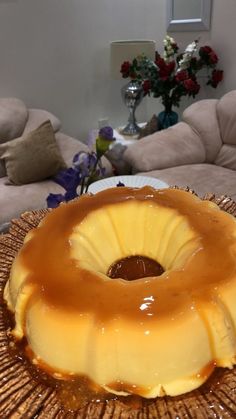 a cake on a plate with caramel sauce drizzled over it