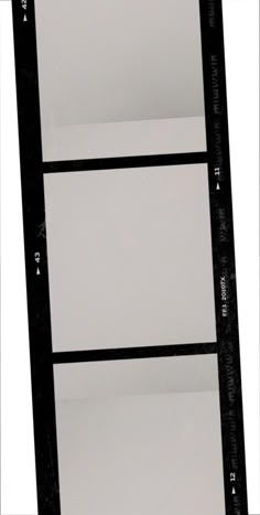 a black and white photo of a mirror with measurements for the frame on it's side