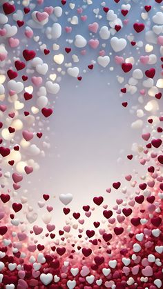 many heart shaped balloons floating in the air