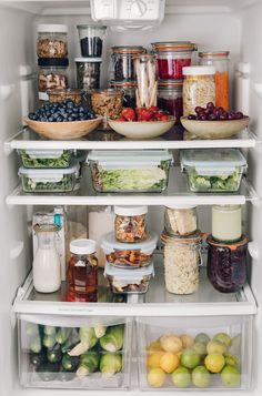 an open refrigerator filled with lots of food