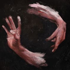 two hands in the shape of a circle on a black background with pink and white paint