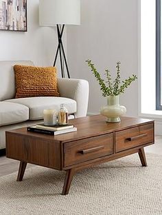 a living room scene with focus on the coffee table