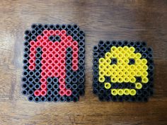 two pieces of lego art made to look like pacman and nunchuck blocks