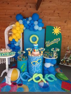 a birthday party with balloons and decorations