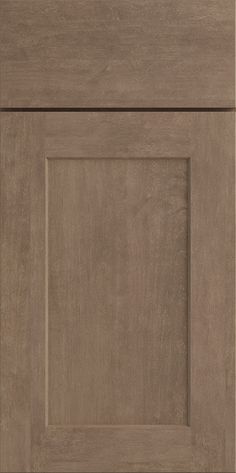 an image of a kitchen cabinet door with no drawer and the bottom panel is made out of wood