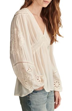 Evoke pure romance in this breezy top designed with an inverted Empire waist and balloon sleeves decorated with embroidered eyelet. V-neck Long sleeves with elastic cuffs Shirred waist 100% viscose Machine wash, tumble dry Imported Pure Romance, Eyelet Top, Nordstrom Store, Balloon Sleeves, Signature Design, Empire Waist, Lucky Brand, Tops Designs, Romance