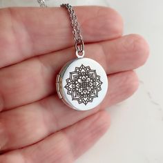 "Introducing my Mandala Locket Collection - a timeless piece of jewelry that is perfect for any occasion. As a symbol of the cosmos or universe, the entire design is symmetrical and balanced. Some spiritual traditions use mandalas for meditation or for marking a spiritual space. The word mandala itself simply means \"circle\" in Sanskrit. This silver plated brass locket is a small size, measuring 20mm in diameter. It opens up to reveal a secret place where you can store your most cherished photo Word Mandala, Locket Necklace Silver, Small Mandala, Spiritual Space, Silver Locket Necklace, Small Icons, Picture Locket, Silver Locket, Secret Place