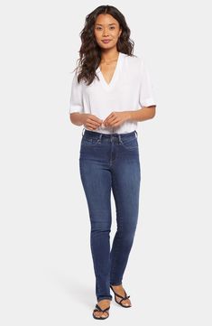 Right in between skinny and straight-leg, these modern jeans flatter with sleek stretch denim and artistic sanding for lived-in appeal. Exclusive lift-tuck technology helps flatten the tummy and lift the rear. 30" inseam; 14" leg opening; 9 3/4" front rise; 15" back rise 84% cotton, 14% Tencel® lyocell, 2% Lycra® elastane Tencel lyocell is a sustainably produced fiber made with closed-loop processing Machine wash, line dry Imported Modern Jeans, Petite Pants, Petite Jeans, Fabric Shop, Bottom Clothes, Slim Jeans, Jean Outfits, Jeans Shop, Stretch Denim