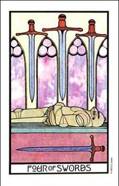 a tarot card with an image of a person laying on the ground next to two swords