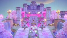 the entrance to a princess's castle decorated in pink and purple flowers with an animal statue