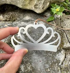 Make your celebration shine with our high-quality stainless steel crown ornament. This beautifully intricate design, laser-cut with precision in the USA, is the perfect party favor for any quincenera, birthday girl, or bachelorette gathering. Create lasting memories with this timeless heirloom piece.Product Details: Ornament Size: 3.75" (on longest side) Made from sustainable materials: stainless steel Handmade in Austin, Texas Free shipping within the USA 1-2 business day processing time Return Crown Ornament, Intricate Design, Perfect Party, Sustainable Materials, Birthday Girl, Austin Texas, Party Favor, Girl Birthday, Laser Cut