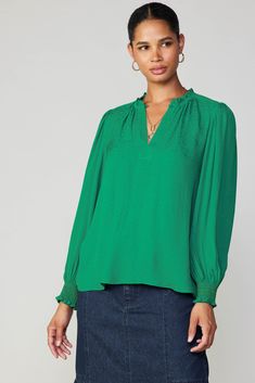 This airy blouse is bound to become a top choice for your workdays and evening outings alike. Done in subtly patterned jacquard, it's detailed with billowy long sleeves, smocked cuffs, and a ruffle-trimmed split neckline fastened by a covered button. •Split neckline with covered button •Ruffle trim •Long sleeves •Smocked cuffs •Relaxed fit Item number 2330287 100% Polyester Spring Long Sleeve Blouse With Crinkle Texture, Spring Long Sleeve Crinkle Texture Blouse, Long Sleeve Blouse With Crinkle Texture For Fall, Green V-neck Blouse With Blouson Sleeves, Spring Green Tops With Crinkle Texture, Green Crinkle Texture Tops For Spring, Green Crinkle Texture Top For Spring, Elegant Long Sleeve Textured Tops, Chic Textured Long Sleeve Blouse