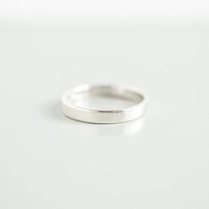 This wide sterling silver ring looks great on its own or in a stack. Pair it with birthstone rings and you have a stylish way to keep your loved ones close even when they're far away.Rings are only sold in sizes 5 6 7 8 9 10 ..........PRODUCT DETAILS•Ring is solid 925 sterling silver •Width of band measures 3mm •Comes beautifully packaged in a gift box..........SHIPPING and POLICIES• Orders are made and shipped within 3-5 business days. See listing photos for most updated shipping times. Interna Round Minimalist Jewelry With Polished Edges, Minimalist Round Jewelry With Polished Edges, Modern Stackable Rings With Thick Band For Anniversary, Modern Thick Band Stackable Rings For Anniversary, Modern Stackable Thick Band Rings For Anniversary, Simple Open Band Stackable Jewelry, Simple Stackable Open Band Jewelry, Stackable Bands As Gift, Minimalist Stackable Rings With Polished Edges For Wedding