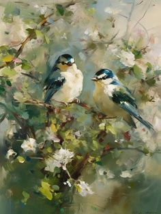 two birds sitting on top of a tree branch with white flowers in the foreground