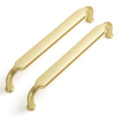 two brass handles on a white background