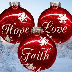 three red christmas ornaments with the words hope love and faith on them