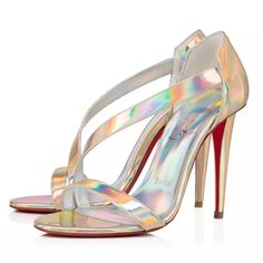 Christian Louboutin Astridal 100 Iridescent Patent Heels Sandals Shoes Size 37 Box Is Marked 39. Shoes Are A 37. Christian Louboutin "Astridal" Sandals In Shiny Iridescent Leather. 4" Stiletto Heel. Crossover Band At Vamp. Slip-On Style. Signature Louboutin Red Bottom These Are Authentic Christian Louboutin Patent Psychic Astridal 100 Pumps Size 37. These Pumps Are Crafted Of Patent Leather In Metallic Silver. They Have A 4 Inch Wrapped Stiletto And Red Soles. Note: Shoe Has A Damage On One Heel Strap Sandals Heels, Christian Louboutin Sandals, Red Louboutin, Patent Heels, Sandal Fashion, Ankle Strap Sandals, Christian Louboutin Shoes, Christian Louboutin Pumps, Strap Sandals