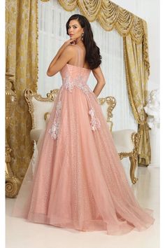 Illuminate the upcoming event in the Royal Queen RQ8080 Dress, where an ethereal rose gold hue compliments the graceful floral design. This dress has a delicate, sheer, wide strap, exuding elegance and contemporary charm. The A-line silhouette flows gracefully, offering a glitter overlay for every figure while catching the light with every move. Ideal for Prom, Pageant activities, or Evening wear, this corset dress blends glamour with a touch of modern allure. Details: Corset Bodice, Soft cup pa Ethereal Rose, Glitter Overlay, Glitter Overlays, Royal Queen, Corset Bodice, Princess Dresses, Pageant Dress, Soft Cup, Gold Floral