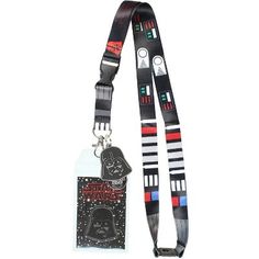 Disney Star Wars is back!  This double-sided lanyard features Darth Vader.  It has a classic lobster clasp to hold your badges, ID's or even to hook your keychain as a key lanyard. A plastic clasp 3 inches up allows for quick disconnecting and it also features a breakaway clasp at the neck.  Attached is a 1.5" rubber Darth Vader helmet pendant. Black Lanyard With Key Leash As Gift, Black Badge Holders With Id Window As Gift, Black Lanyard With Key Leash For Personal Use, Themed Black Badge Holders For Gift, Lanyard Badge Holder, Vader Helmet, Darth Vader Helmet, Id Lanyard, Key Lanyard