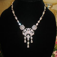 Beautiful Sparkle Silver Art Deco Necklace, Encrusted With Crystals, 3 Dangle Drop Pear Shaped Cz, Floral And Fan Design, 16" Long, 2" Extender, 2 1/2" Fan Drop, Purchased Over 30 Years Ago, Never Worn Cubic Zirconia Dangle Necklace With Rhinestones, Exquisite Crystal Diamond Necklace With Elegant Design, Luxury Rhinestone Diamond Necklace For Wedding, Luxury Diamond Necklace With Rhinestones For Wedding, Formal Dangle Rhinestone Necklaces, Formal Rhinestone Dangle Necklaces, Elegant Rhinestone Necklaces, Elegant Backdrop Necklace With Rhinestones For Gift, Elegant Crystal Embellished Necklaces For Anniversary