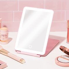 Get our travel friendly LED Rechargable Mirror. It is slim and compact for when you are on the go! Beauty Creations, Aesthetic Pastel, Aesthetic Pastel Wallpaper, Pastel Wallpaper, Led Mirror, Pastel Aesthetic, The Go, Pastel, Mirror