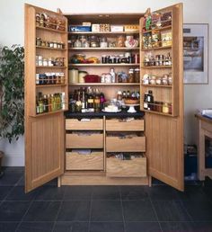 an open pantry with lots of food in it