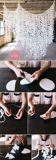 the instructions to make a chandelier with white paper flowers