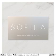 a business card with the word sophia on it in white and silver foil