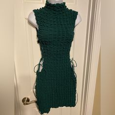 Beautiful Dark Green Cocktail Dress With Cut Outs On Both Sides. Perfect For A Night Out. Dress Has No Zipper, Has Strings On Both Sides So You Can Make It As Tight As You Would Like. Size Is An Xl. Never Worn But Are Gone. Green Fitted High Neck Dress, Fitted High Neck Green Dress, Green Fitted High-neck Dress, Chic Green High Neck Mini Dress, Chic Green High-neck Mini Dress, Casual High Neck Party Dress, Casual High Neck Bodycon Dress For Party, Casual Green Mini Dress For Party, Dark Green Cocktail Dress