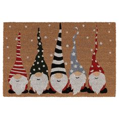 a door mat with three gnomes on it