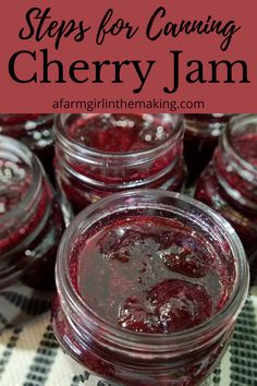 jars filled with jam sitting on top of a checkered table cloth and text overlay reads tips for canning cherry jam