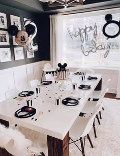 a dining room table with mickey mouse decorations