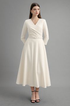 Classic V-neck Semi-formal Dress, Formal Cotton A-line Midi Dress, Elegant V-neck Dress With Surplice Neckline For Fall, White V-neck Midi Dress For Formal Occasions, Elegant Cream A-line Maxi Dress, Formal Cream A-line Maxi Dress, Cream A-line Dress For Work, V-neck Fit And Flare Midi Dress For Work, Cream V-neck Dress For Fall