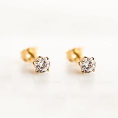 The Dainty CZ Stud Earrings are sure to make you feel beautiful every time you wear them. With just the right amount of sparkle, these timeless earrings make a sweet statement on their own - or wear them with your favorite pair of our hoop earrings for an extra touch of glam. Perfect for daily wear and for your most special occasions. DETAILS 14k gold filled -or- sterling silver studs & butterfly closure 3mm cubic zirconia Post: 9.5mm length, 21 gauge Safe for sensitive skin & shower safe Solid Elegant Everyday Hypoallergenic Crystal Earrings, Elegant Hypoallergenic Crystal Earrings For Everyday, Classic Everyday Diamond Earrings With Matching Set, Classic Hypoallergenic Crystal Earrings As Gift, Classic Bridal Earrings As Gift, Classic Pierced Bridal Earrings As Gift, Classic Hypoallergenic Crystal Earrings For Anniversary, Classic Crystal Earrings, Classic Crystal Earrings For Anniversary