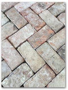 a close up view of a brick walkway