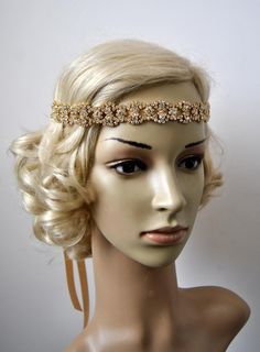 Beautiful sparkling Rhinestone Style flapper headband. Perfect for a vintage inspired bride, 1920's wedding or Great Gatsby party or any special occasions. Great for a bride or bridesmaid, flower girls. Glamour and stylish Unique and romantic. Made of - stunning clear rhinestone crystal gold shade headband, all high sparkle different size crystal rhinestones - satin ribbon - your choice of color Headband can be put down on the forehead or up on head. Can be worn as a flapper or traditional style Bridal Rhinestone Headpiece, Boho Wedding Veil, Prom Headband, Flapper Wedding, Gatsby Headpiece, Bridesmaid Headband, Pearl Bridal Headband, Rhinestone Headpiece, Flapper Headband