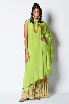 Shop for Rishi and Vibhuti Green Crepe One Shoulder Kaftan And Printed Gharara for Women Online at Aza Fashions Traditional Drape Kaftan With Gota Work For Parties, Party Kaftan With Gota Work And Traditional Drape, Festive Party Kaftan With Gota Work, Bollywood Style Kaftan With Gota Work For Party, Navratri Party Kaftan With Gota Work, Traditional Palazzo Set With Tassels For Party, Traditional Tassel Palazzo Set For Parties, Festive Party Palazzo Set With Tassels, Festive Straight Kurta Sharara With Tassels