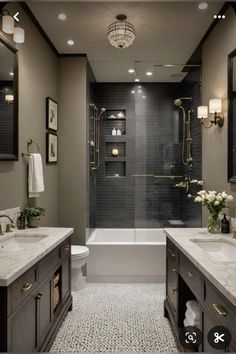 a large bathroom with two sinks and a walk in shower