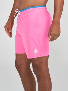 Grab your sunglasses and your flamingo floaty and sink into island time with these classic swimmers. These jealousy-inducing trunks feature an ultra quick drying shell, mesh basket liner and a zipper back pocket. Not to mention the elastic waistband and build-in drawstring designed to keep your trunks secure from the swim up bar all the way to the all you can eat crab leg buffet. Fabric: 92% Polyester/8% Spandex Machine Wash Cold, Tumble Dry Low Best for: Swimming, Sunbathing, Boat Days, Boogie Casual Swim Trunks With Uv Protection For Surfing, Fitted Swim Trunks For Water Sports, Pink Summer Swim Trunks For Water Sports, Summer Surfing Swimwear With 4-way Stretch, Casual Nylon Swim Trunks For Surfing, Casual Swim Trunks With Uv Protection For Sports, Fitted Solid Color Swim Trunks For Water Sports, Athleisure Swim Trunks For Surfing In Summer, Athleisure Swim Trunks For Summer Surfing