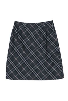 Get into the back-to-school vibe with this prim and stylish plaid skirt from Burberry! This midi skirt is 100% wool and will make for a great piece to wear this fall along with a button-up blouse and knit vest. Size 6 Shell: 100% Wool Lining: 100% Cupro Made in Italy Side concealed zipper closure Fully lined A-line silhouette Waist 28" Hip 36" Total length 21.5" Burberry Skirt, Wool Midi Skirt, Burberry Plaid, Buy Shoes Online, Plaid Skirt, Jacket Design, Plaid Skirts, Knit Vest, Wool Plaid