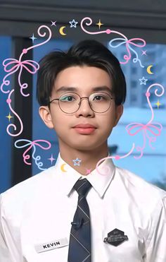 a young man wearing glasses and a tie with swirls on it's chest