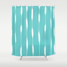 a blue shower curtain with white lines on it