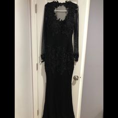 Form Fitted One Of A Kind Black Gown Black Long Sleeve Gala Gown, Black Maxi Mother Of The Bride Dress For Wedding, Black Fitted Long Sleeve Mother Of The Bride Dress, Fitted Floor-length Black Mother Of The Bride Dress, Black Floor-length Mother Of The Bride Dress, Elegant Black Floor-length Mother Of The Bride Dress, Elegant Black Lace Gown, Formal Black Maxi Mother Of The Bride Dress, Elegant Black Maxi Length Mother Of The Bride Dress