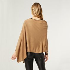 Our Lightweight Poncho is the perfect addition to any wardrobe. It’s made of soft, lightweight fabric perfect for layering. It can be worn year-round and is a must-have for work, travel, or on-the-go. This versatile poncho can be worn multiple ways including a scarf, poncho, cape and more. Pair with our Embrace Fashion Fasteners to create a unique look. Features: Color: Taupe Multiple ways to wear Perfect for layering Wear all year round Sizing: One Size Fits Most: Best fits US woman’s sizes 0-1 Beige Poncho For Layering, One Size Beige Poncho For Layering, Chic Poncho For Layering, Chic One-size Cape For Layering, Chic One Size Cape For Layering, Brown Poncho For Layering, One Size, Chic One-size Poncho For Layering, Winter Layering Poncho, One Size Cape For Layering