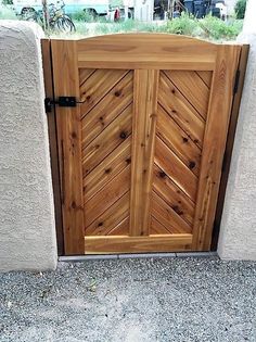 an open wooden door on the side of a building