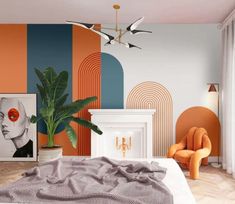 a bedroom decorated in orange, blue and white with an artful wall mural behind the bed